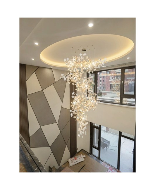 Duplex building with large chandelier, loft staircase light, luxury villa with elevated ceiling, living room, lobby, sales department, ginkgo leaf light