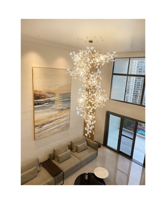 Duplex building with large chandelier, loft staircase light, luxury villa with elevated ceiling, living room, lobby, sales department, ginkgo leaf light