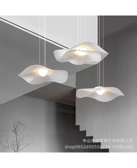 Modern and minimalist Nordic LED lotus leaf lamp for girls with Instagram style creative and personalized lighting for restaurants. Internet famous fabric pendant light