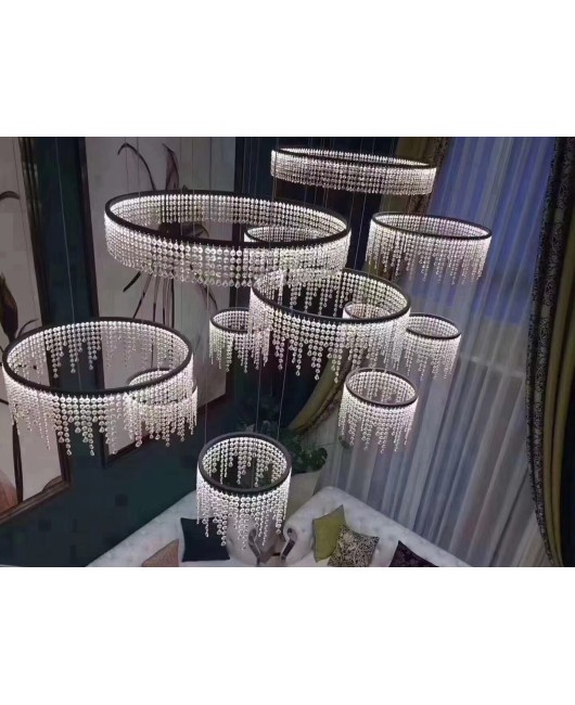 Villa staircase light, modern, luxurious, atmospheric, high ceiling, hollow lobby, revolving staircase, stainless steel crystal chandelier